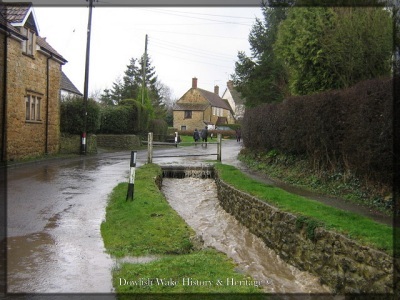 Heavy rain in Main Street, Dowlish Wake