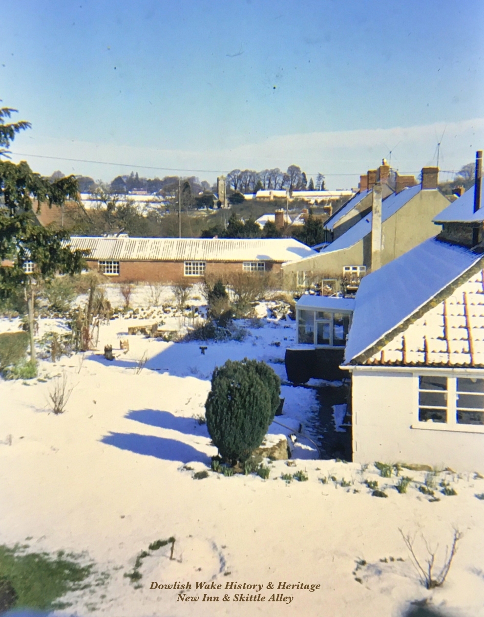 Rear of New Inn and Skittle Alley, Rose Cottage in foreground.
