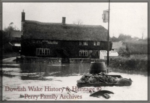 Lower Farm with cart in flooded ford. [Dower House]